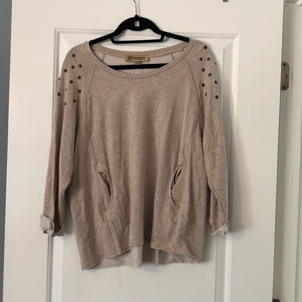 Quarter length sleeve tan shirt